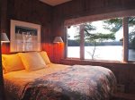 Main Cottage - Guest Bedroom with Queen bed and lake views